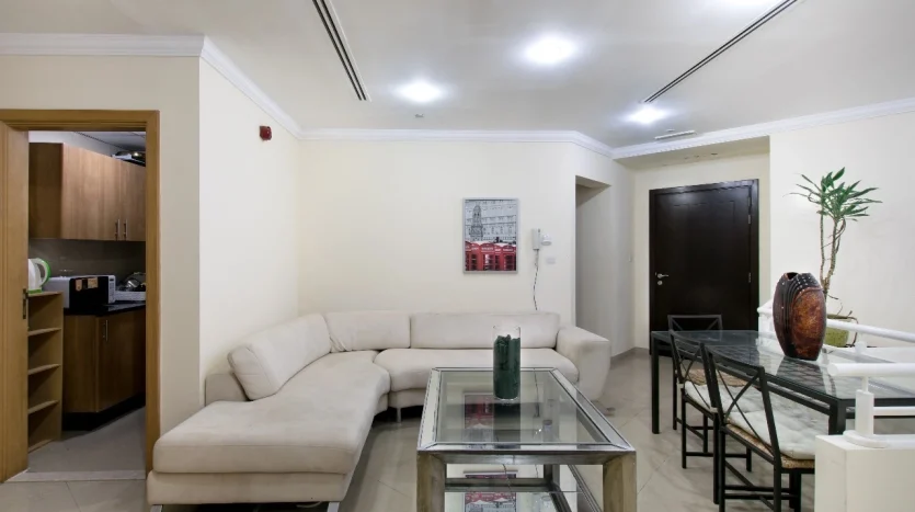 this picture shows a reception space next to a bed space available for rent in Marina.