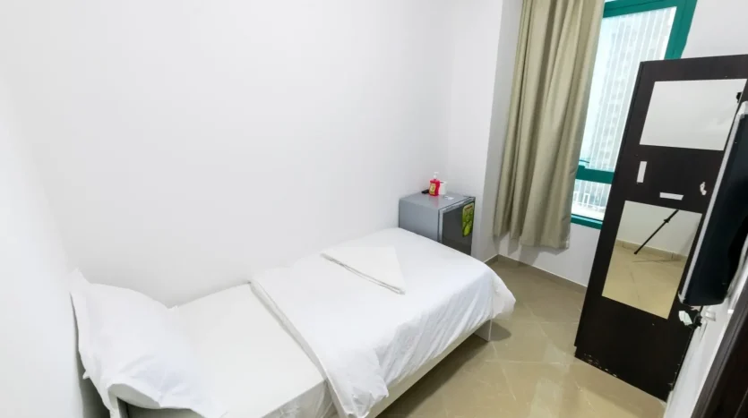 a photo includes a bed within Single Room for Rent in Dubai Marina – For Males Only at special offer.