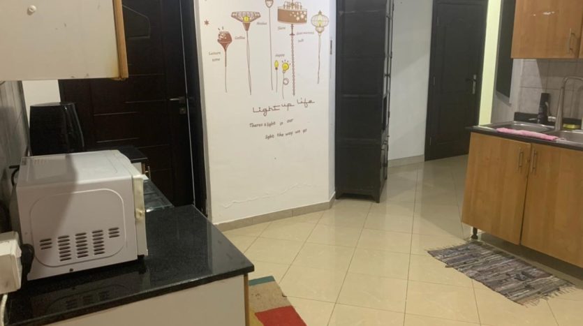 this picture shows a kitchen with a single room for rent in Marina Dubai with a special offer.