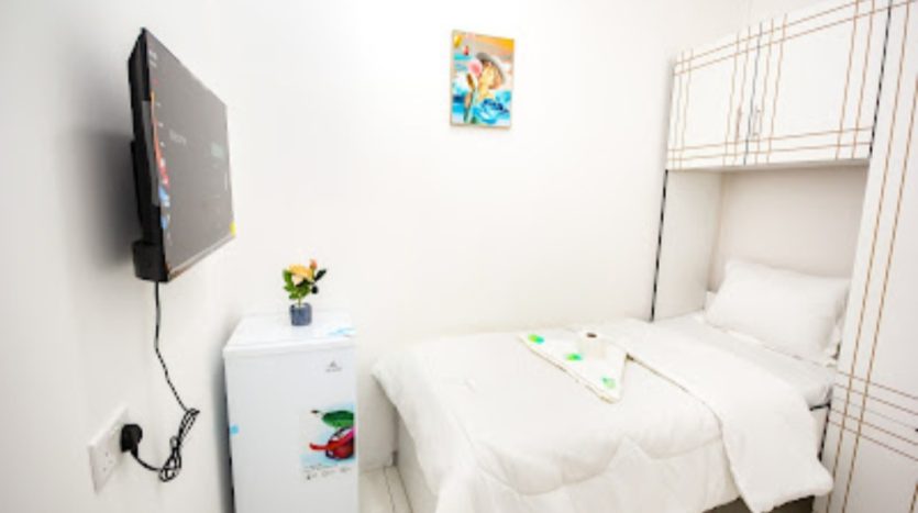 This picture shows a Small Room in al Qusais available for rent.