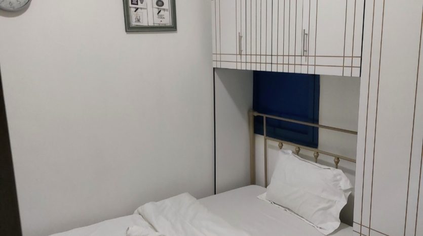 This picture includes a bed in a partition for rent in Al Qusais - Dubai.