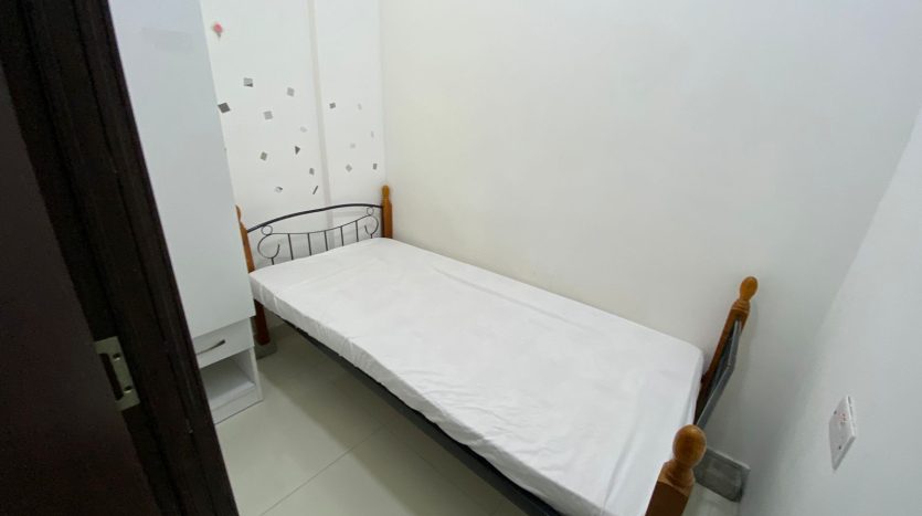 This picture shows a bed in Partition in Al Quoz for rent - Dubai