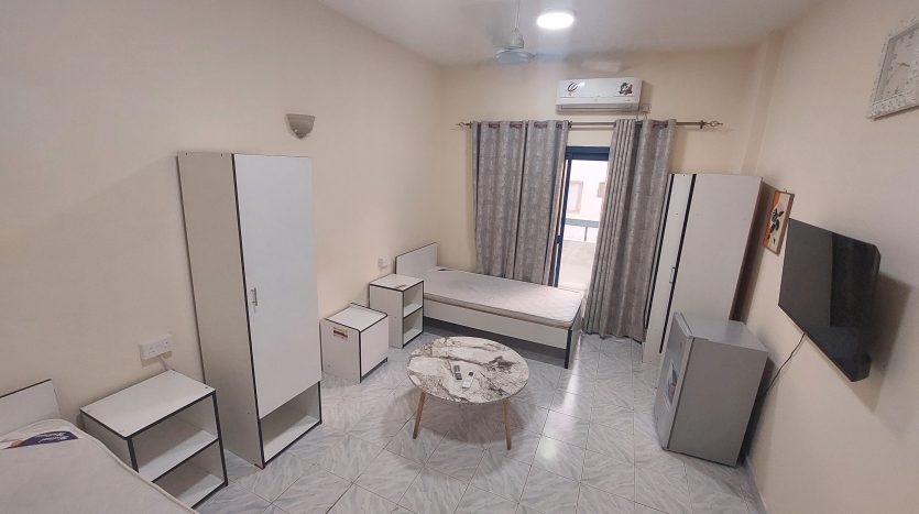 This picture shows a semi-master room for rent in Al Qusais