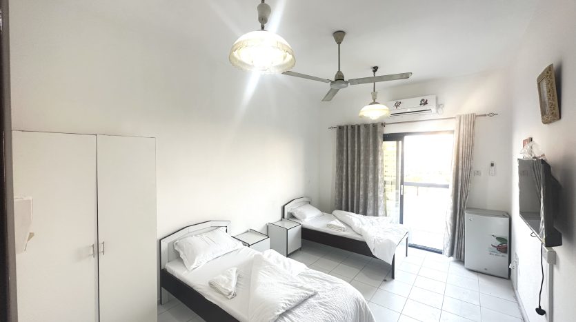 This picture shows a semi-master room in Al Qusais for rent.