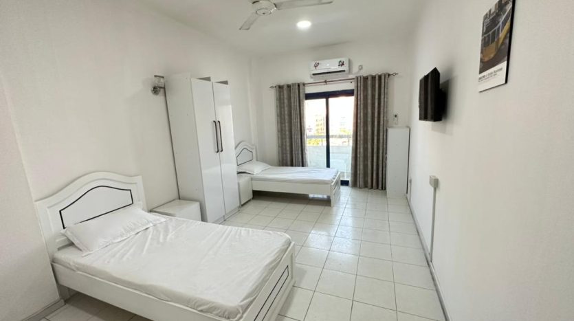 Spacious Semi-Master Room with Balcony – Al Qusais, Dubai