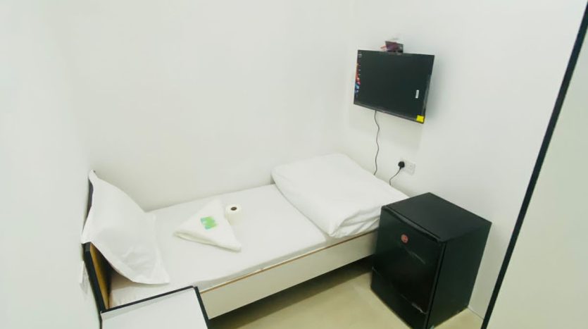 This picture shows a Small room for rent in Al Qusais - for Males
