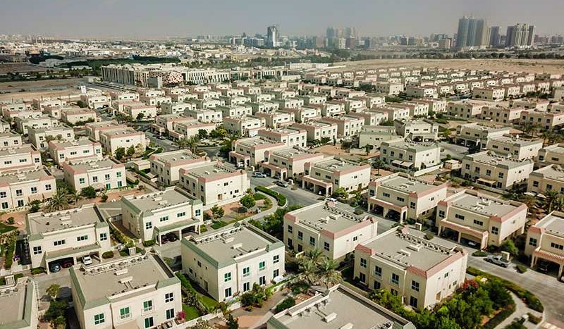 This picture shows aerial shot in Al Qusais with article about cost rental - activites - Housing