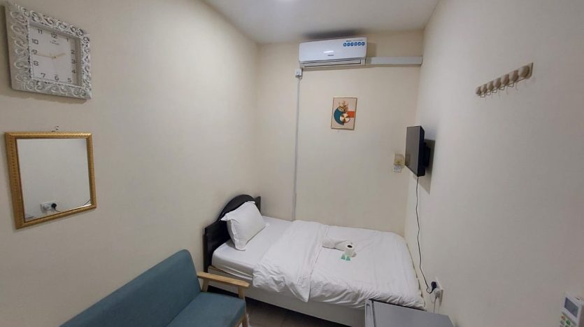 This picture shows a Small room in Al Qusais for Rent - Families Only