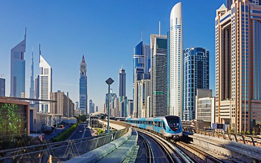 A picture of Dubai city accompanied by an article about the pros and cons of living there.